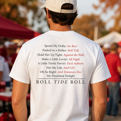 Alabama fan wearing a white Dixieland Delight Roll Tide lyrics T-shirt at a game-day tailgate