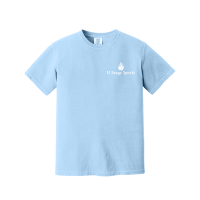 A light blue short-sleeve crewneck t-shirt with a small white chest graphic that reads 'El Fuego Sports' next to a flame icon, displayed on a solid white background.